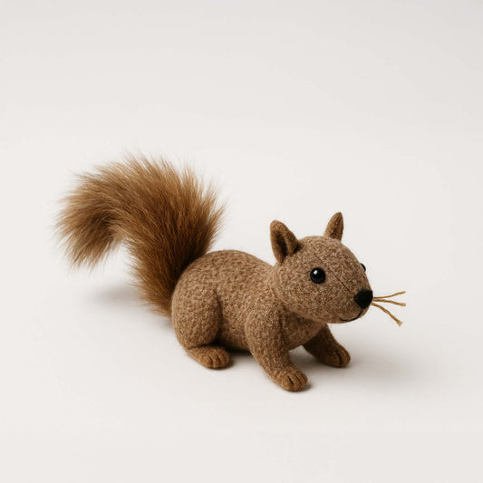 Stuffed toy squirrel on a white background